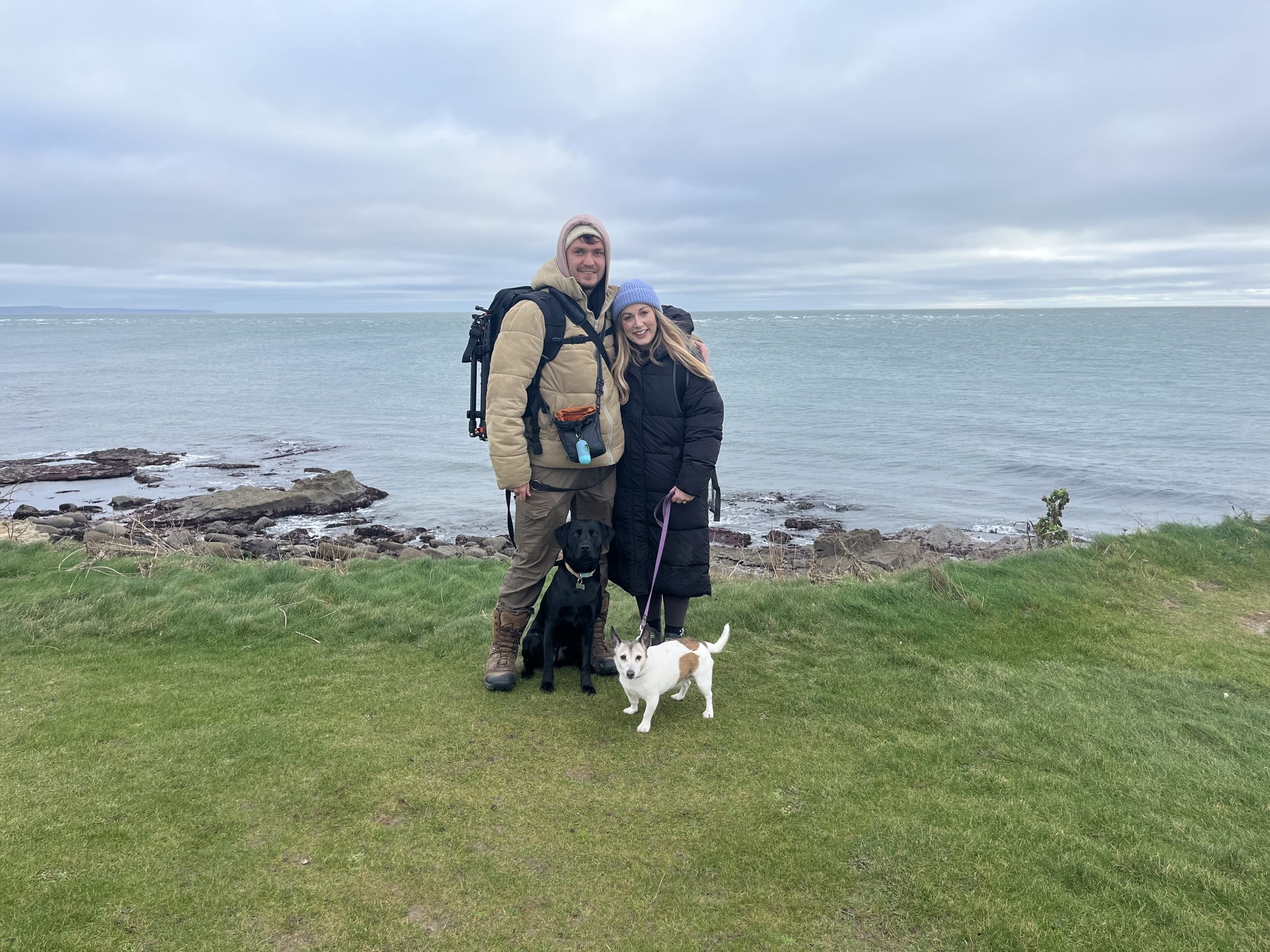 Family walking with Nova and Pippa